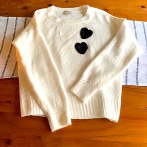Beautiful soft ivory sweater with black hearts